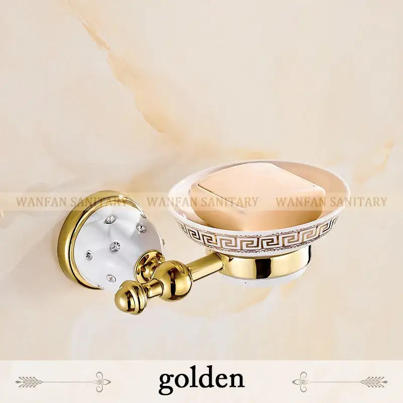 Golden bathroom soap dish with greek key pattern and crystal accents from gold and white crystal bath hardware set