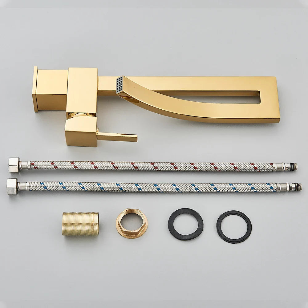 Gold finished modern bathroom basin faucet with sleek rectangular spout and square handle single hole deck mounted design