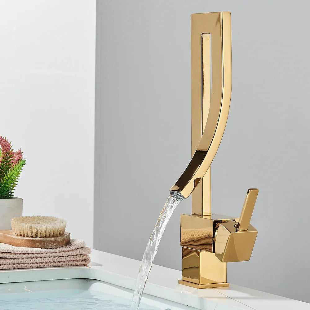 Gold bathroom basin faucet deck mounted single hole with sleek angular design and flowing water hot and cold mixer taps chrome black