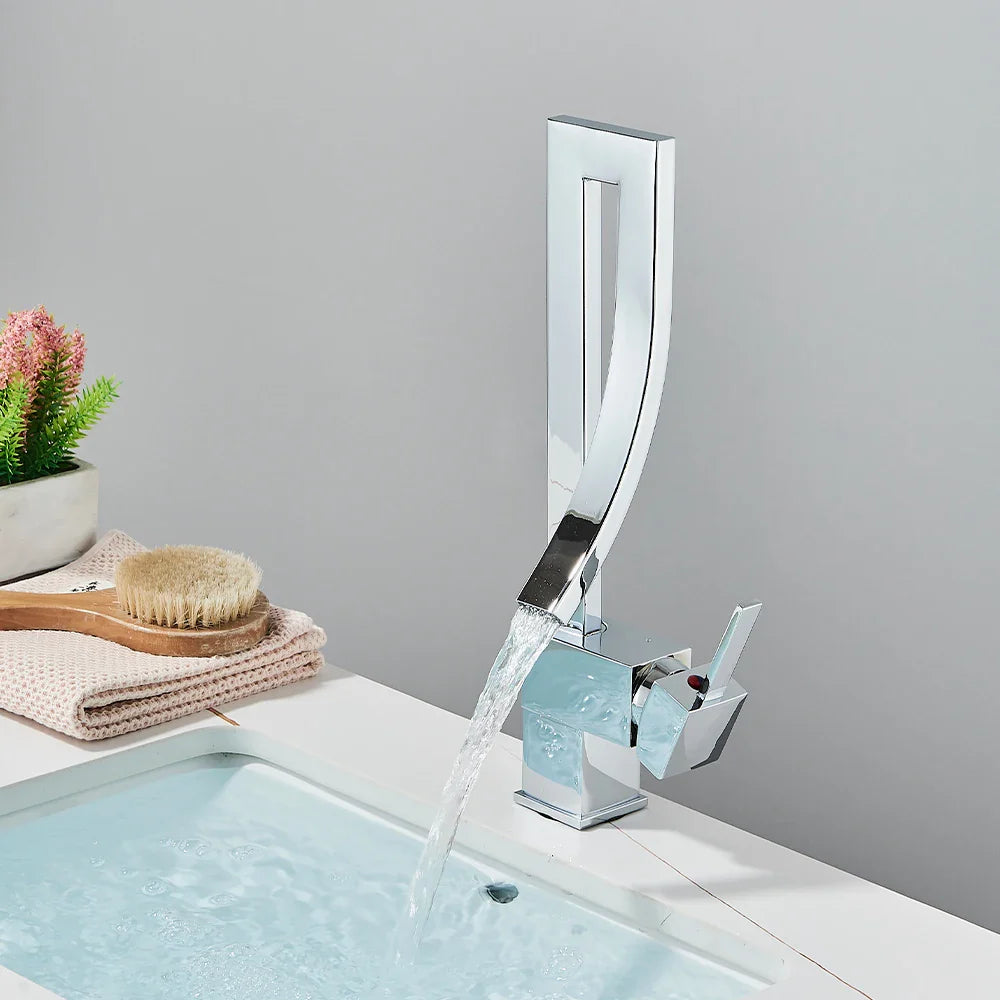 Modern chrome-finished single hole deck mounted gold bathroom basin faucet with waterfall design and integrated handle