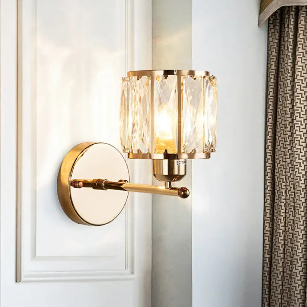 Gold-toned wall lamp with beveled cut crystal cylindrical shade sconce light fixture for bedroom use