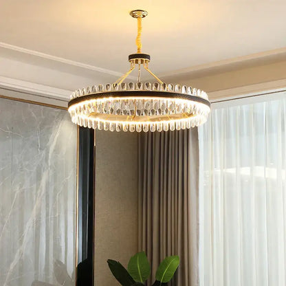 Gold and black crystal oval chandelier with gold metal frame and teardrop crystal droplets for dining room decorbites crystal oval