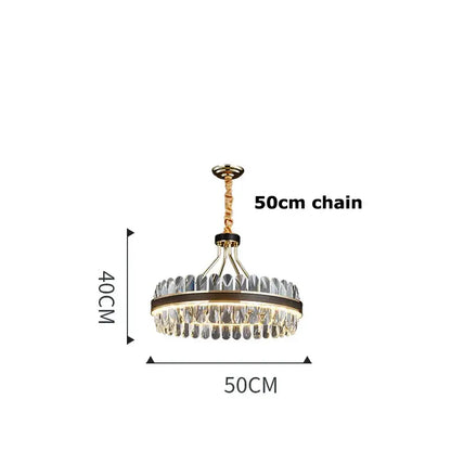 Gold and black decorbites crystal oval chandelier with a gold metal frame and clear crystal droplets for dining room decor