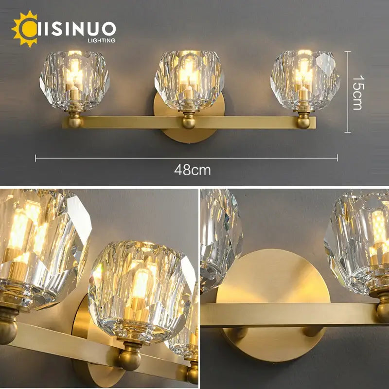 Gold brass vanity light fixture with three faceted crystal shades designed for bathroom vanity lighting