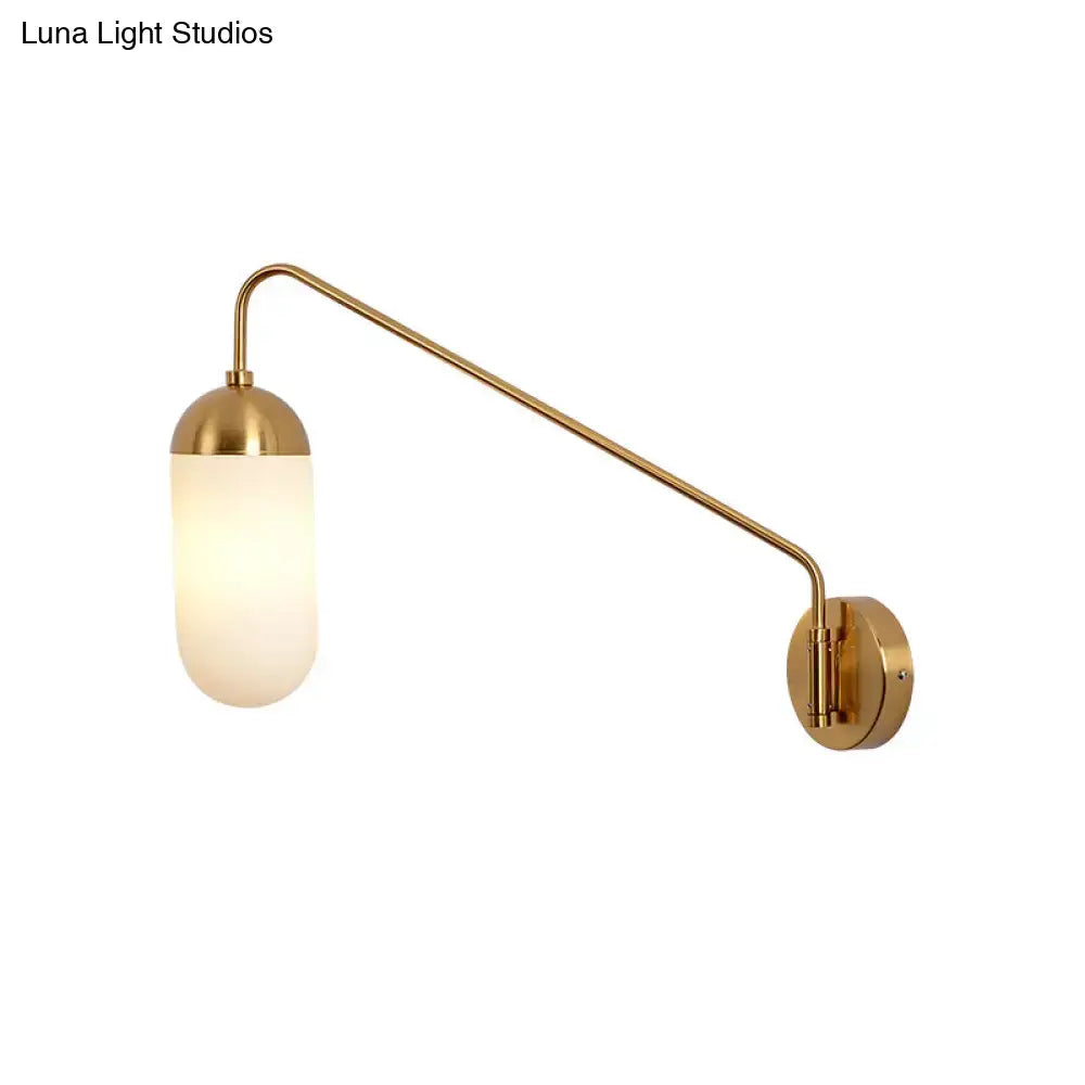 Gold brass wall lamp with frosted glass wall sconce and curved arm for bedroom lighting