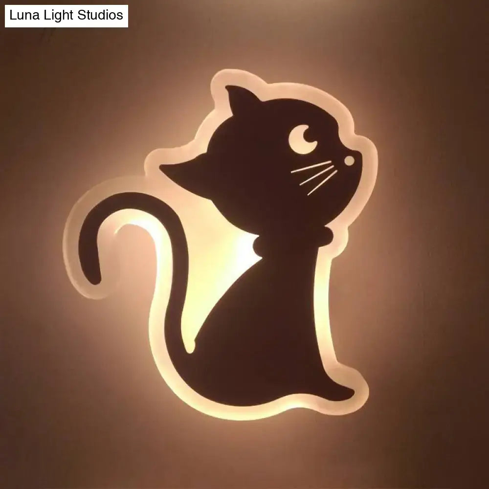 A sleek black cat-shaped led wall light with a glowing white outline for children’s bedroom wall lights