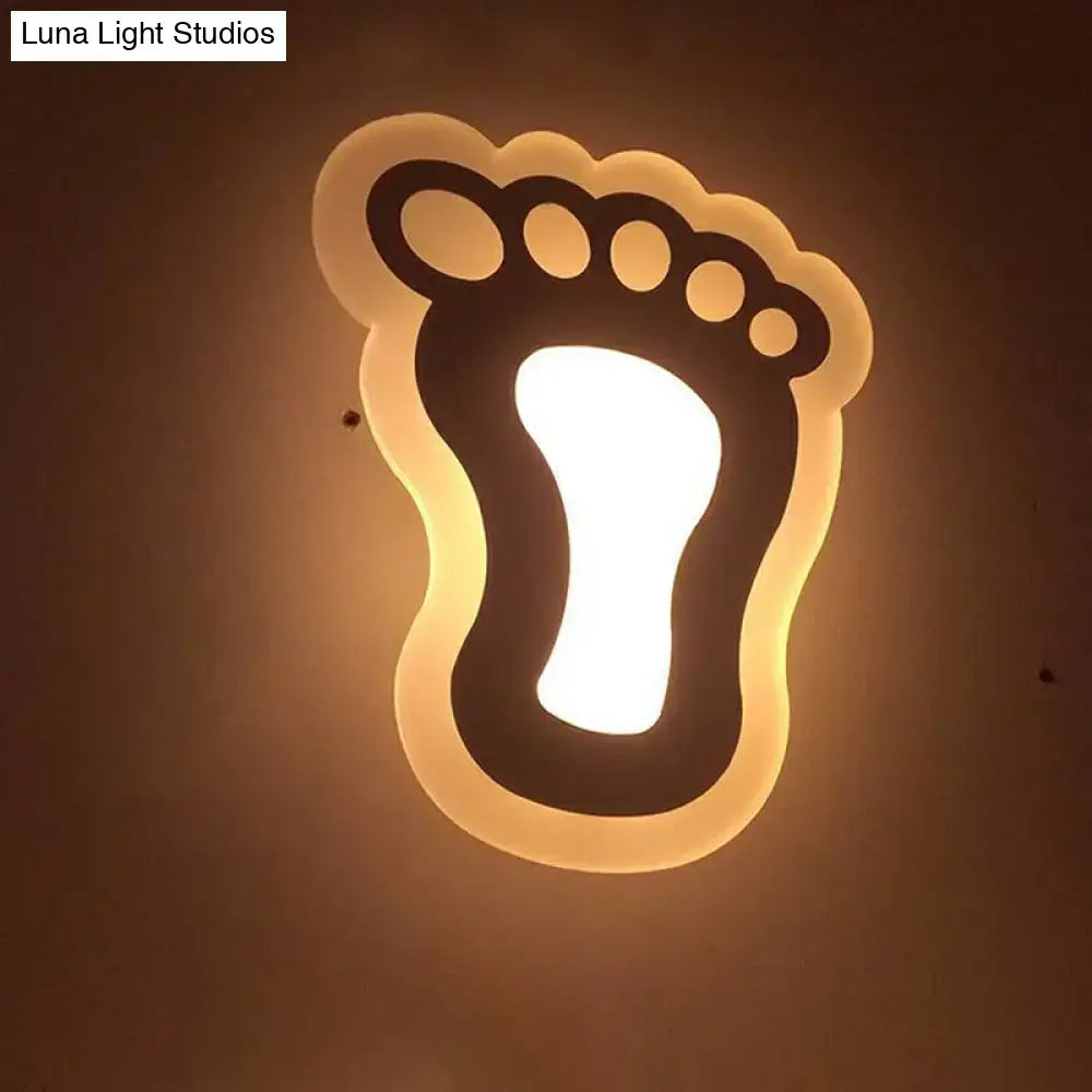 Warm-toned gold and brown crescent LED wall light with illuminated foot design for children’s bedroom wall lights