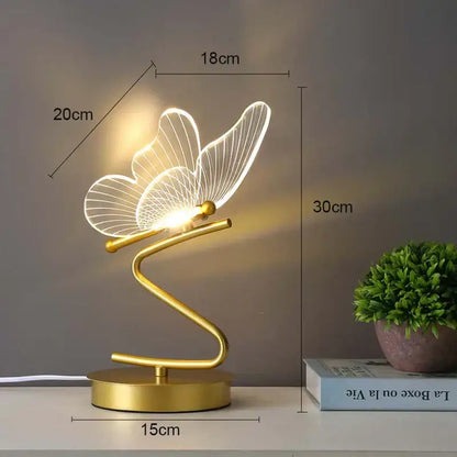Gold butterfly led table lamp with translucent butterfly led wings and curved metallic base as bedroom accent decorbites butterfly led table lamp