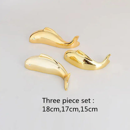 Set of three golden dolphin-shaped decorative figurines with gemstone eyes for decorbites carp fish lotus wall art decor