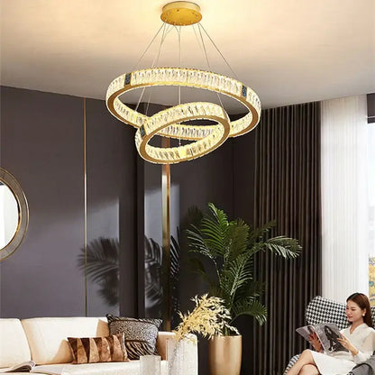 Gold circular decorbites crystal led chandelier with interlocking rings and clear crystals for dining room lighting