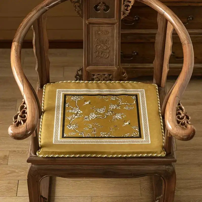 Gold crane birds branches lumbar pillow case with embroidered white blossoms on velvet fabric and ornate greek key border