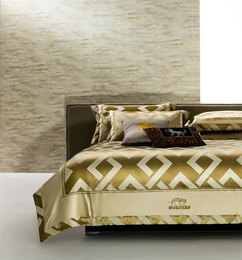 Gold and cream geometric-patterned satin duvet cover with embroidered bordels logo in egyptian cotton decorbites american jacquard bedding set