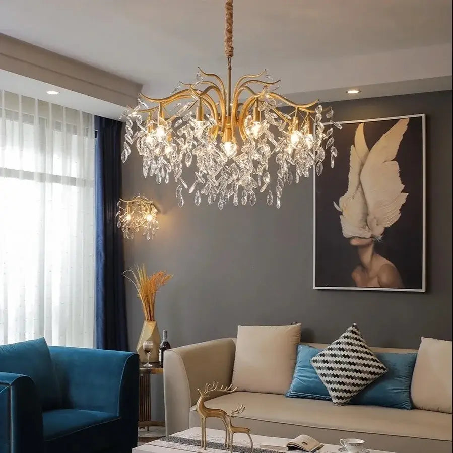 Gold-toned decorbites crystal branch chandelier with intricate arms and cascading clear crystal droplets for luxury living room lighting