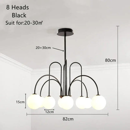 Black metal ball pendant chandelier with eight frosted glass ball light heads for dining room decorbites glass ball