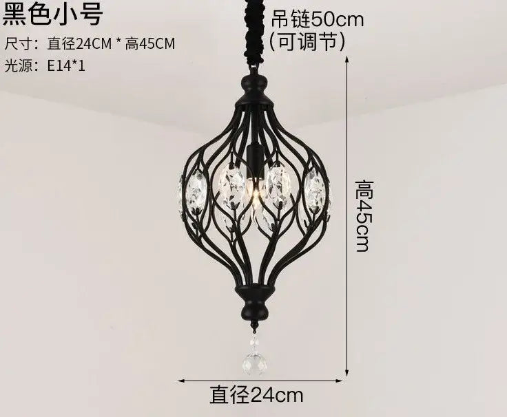Black wrought iron pendant lights with crystal accents and a dangling crystal pendant from decorbites art design