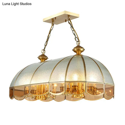 Gold-toned brass pendant light with dome-shaped frosted and clear glass shade for dining room 110v-120v use e26 e27 e12 e14