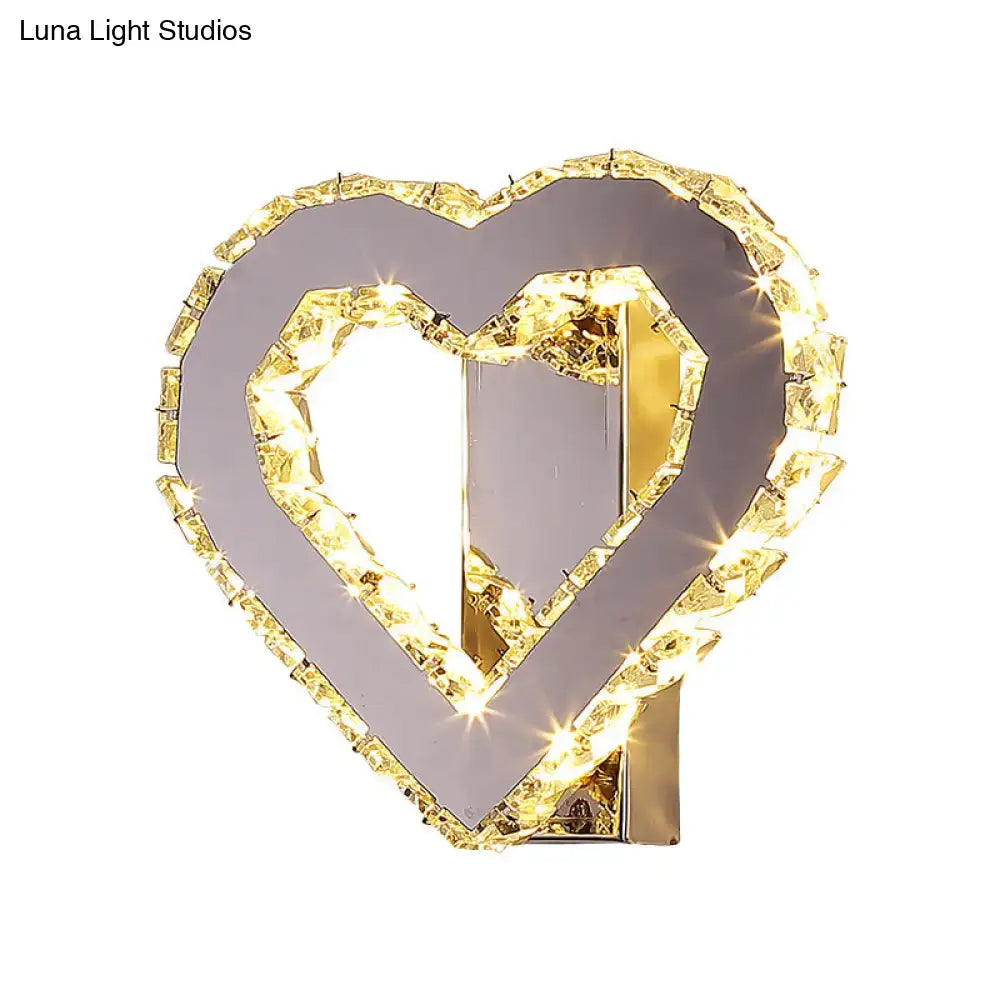 Gold faceted crystal heart design wall sconce with gold accents stainless steel and mirrored interior led lights