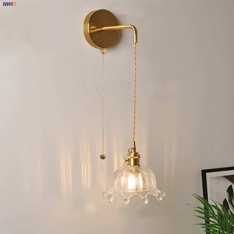 Gold-toned wall lights with decorbites clear glass led fluted shade and decorative crystal droplets for bedroom sconce decor