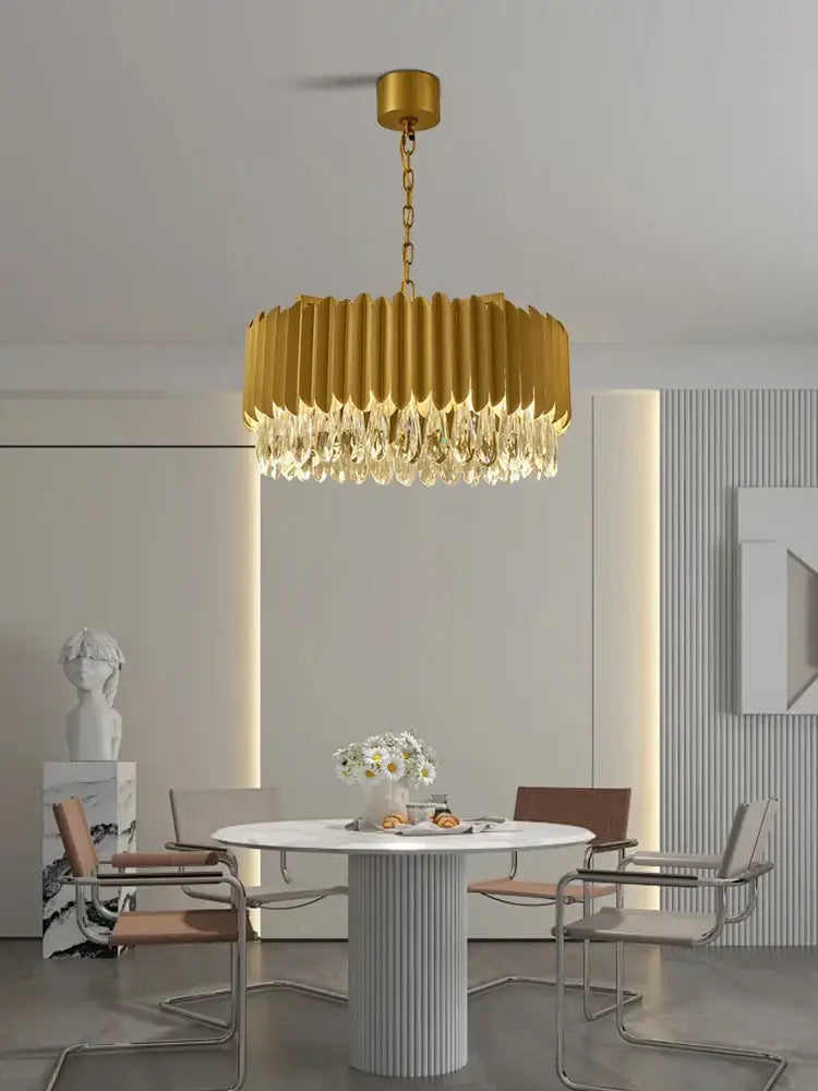 Gold fluted crystal water droplet pendant lights with modern design and dangling crystal droplets for dining room decorbites