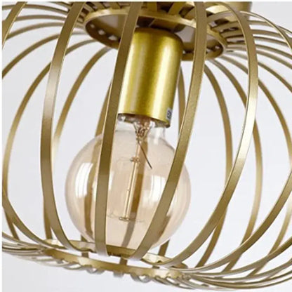 Gold iron art ceiling light with wireframe design featuring a gold-toned metal cage pendant light with clear glass bulb