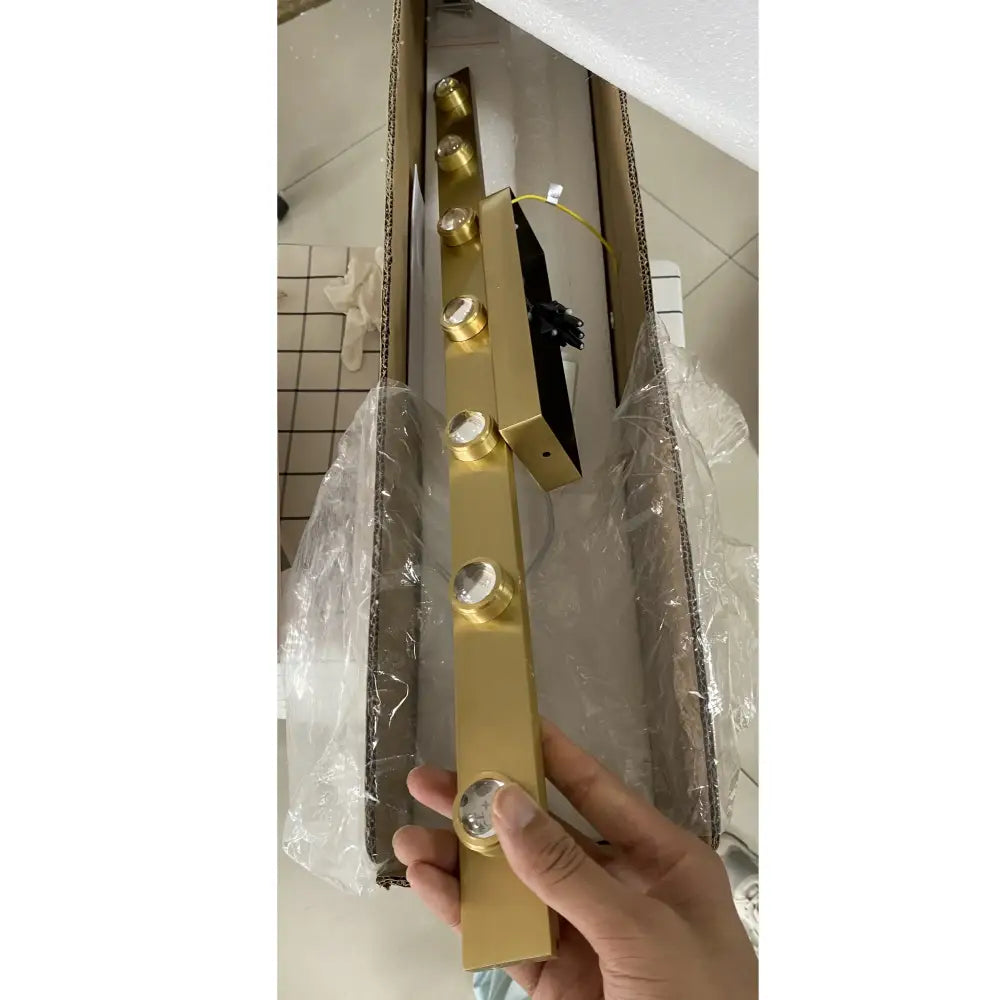 Gold iron art mirror wall sconce with five circular led bulbs designed as a rectangular bathroom decorbites iron art light