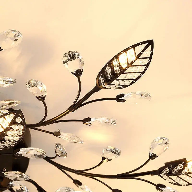 Gold leaf decorbites crystal ceiling chandelier with dark bronze metal frame and clear crystal droplets for living room