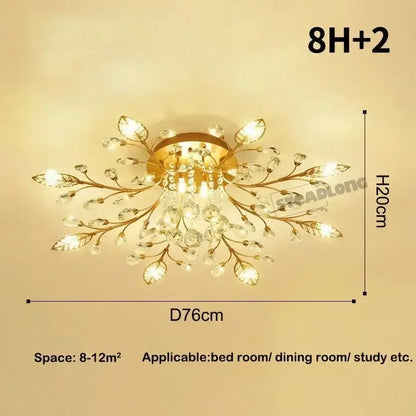 Gold-toned decorbites crystal ceiling chandelier with intricate leaf design and clear faceted crystals for living room light