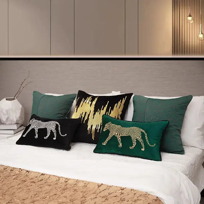 Set of four black pillow covers with gold leopard embroidered designs in silver, gold, and green for living room decorbites decor