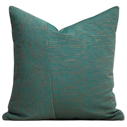 Teal textured throw pillow cover with vertical seam and two woven patterns from decorbites gold leopard embroidered set