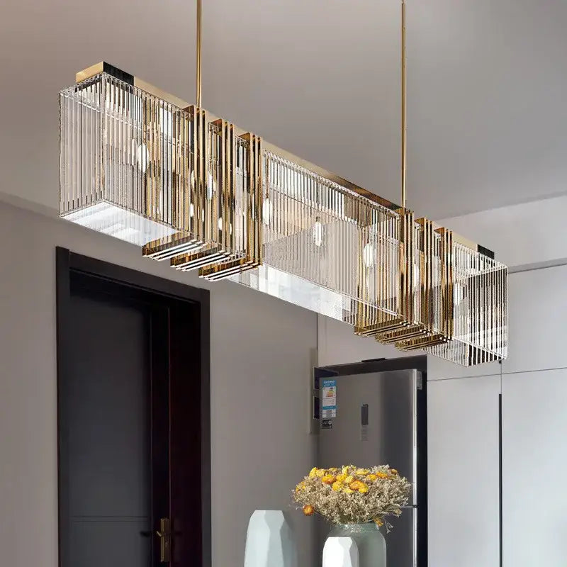 Gold lustre steel pendant light with gold-toned rectangular frame and vertical crystal rods for dining room decorbites gold lustre