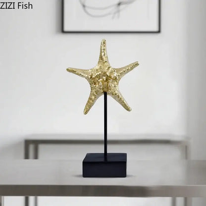 Golden starfish gold mermaid statue resin sculpture with textured surface on black stand for living room decor