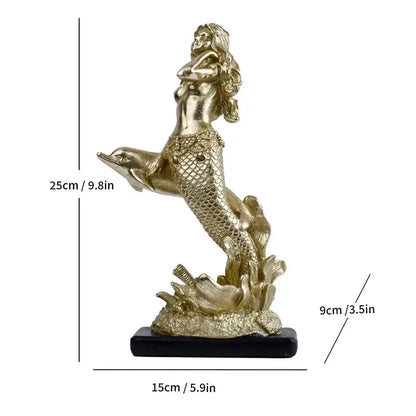 Golden mermaid statue resin sculpture with detailed scales and flowing hair standing on a dolphin on black base