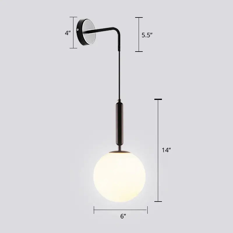 Modern black metal light fixture with frosted opal glass spherical wall globe for bedroom lighting