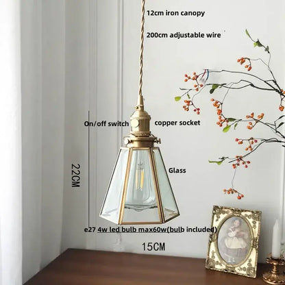 Antique brass-finished gold petal glass led pendant lamp with clear panels and visible led bulb for kitchen lighting