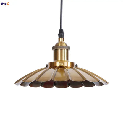 Brass-colored fluted pendant lights with gold retro edison design for dining room decor by decorbites