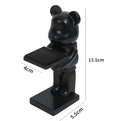 Black glossy bear statue watch rack holding a rectangular tray for bedroom storage and display use