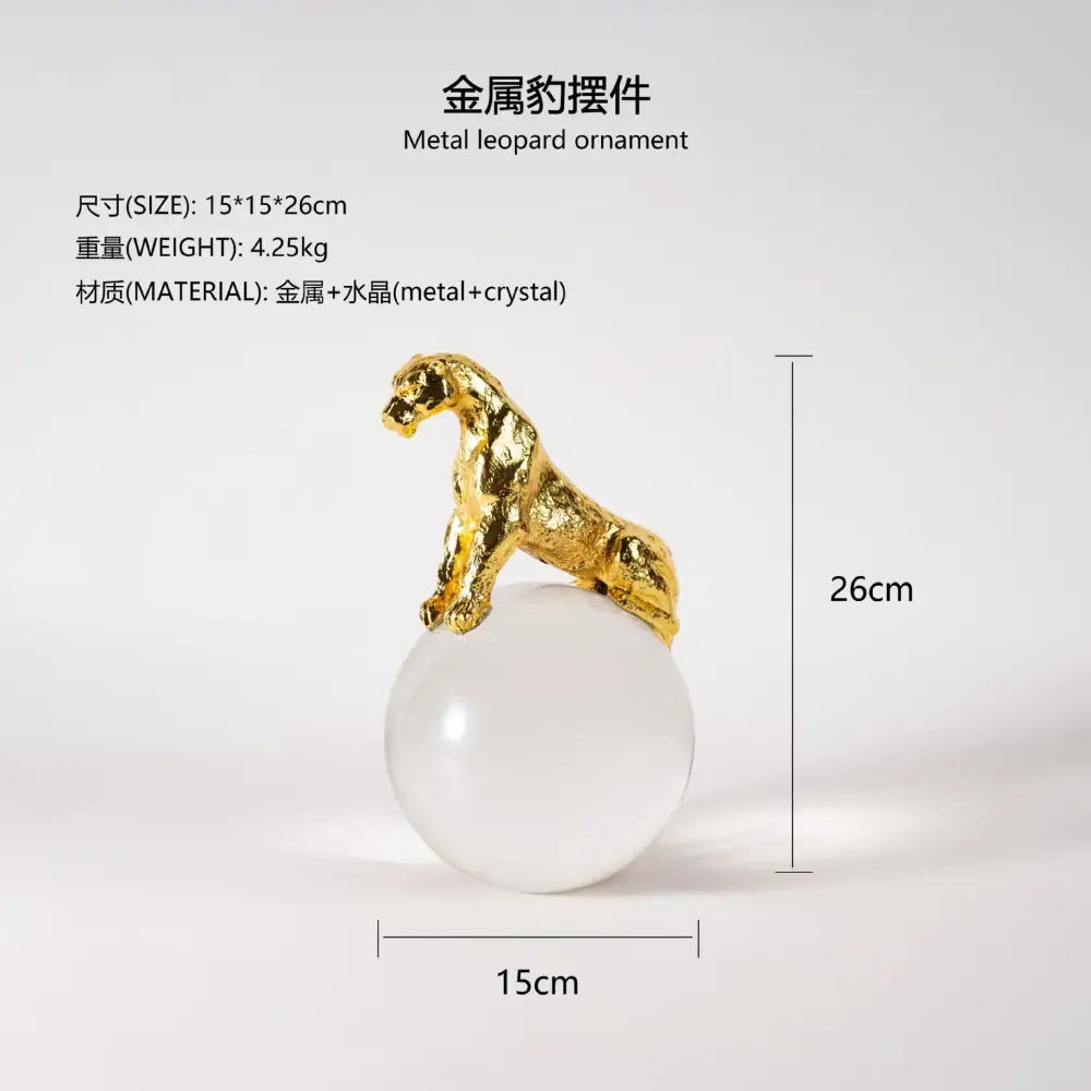 Gold metal leopard crystal ball decorbites leopard crystal sculpture atop a translucent white sphere for living room decor