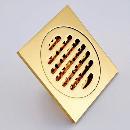 Gold decorbites gold square bathroom shower drain with interchangeable circular slotted grate design
