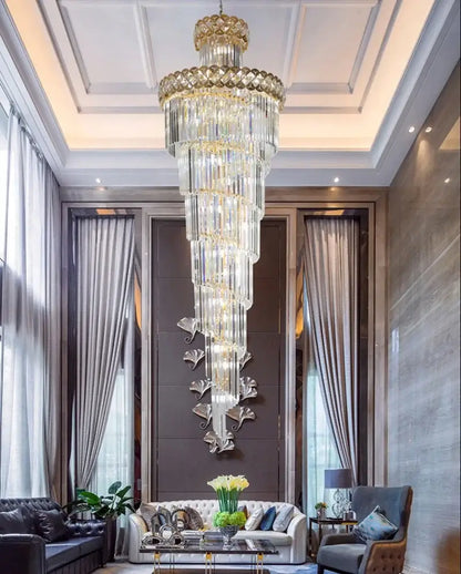 A towering multi-tiered gold stainless steel crystal chandelier pendant light for staircase decorbites gold stainless design