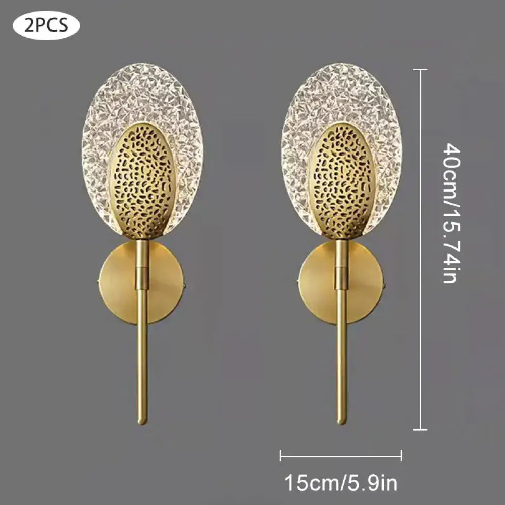 Gold-toned led wall lamp with textured glass and oval crystal panels for elegant indoor lighting in bedrooms