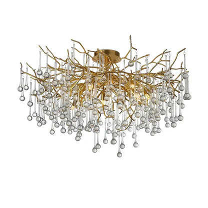 Gold tree branch chandelier with intricate gold tree arms and clear glass crystal droplets for dining room lighting
