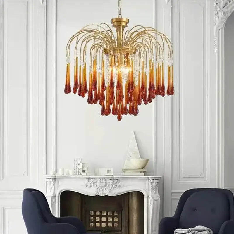 Golden amber crystal water drop chandelier with cascading glass teardrop pendants for dining room light