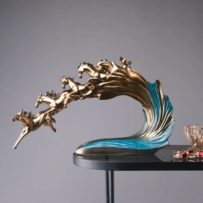 Golden and blue galloping horse luxury sculpture with dynamic motion and flowing turquoise wave base for living room decorbites galloping horse