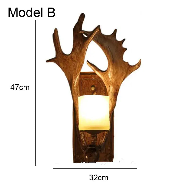 Golden antler deer horn wall lamp with warm glowing light and rustic wooden base by decorbites deer horn for living room decor