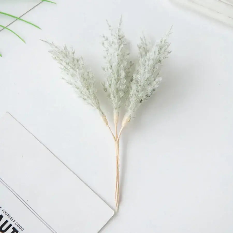 Golden artificial autumn branches set featuring delicate pale green artificial autumn branches with feathery plumes decorbites artificial autumn