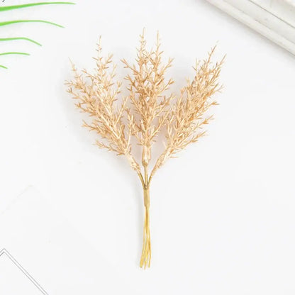 Golden artificial autumn branches set featuring dried grass with feathery branches and bundled base for living room decorbites decor