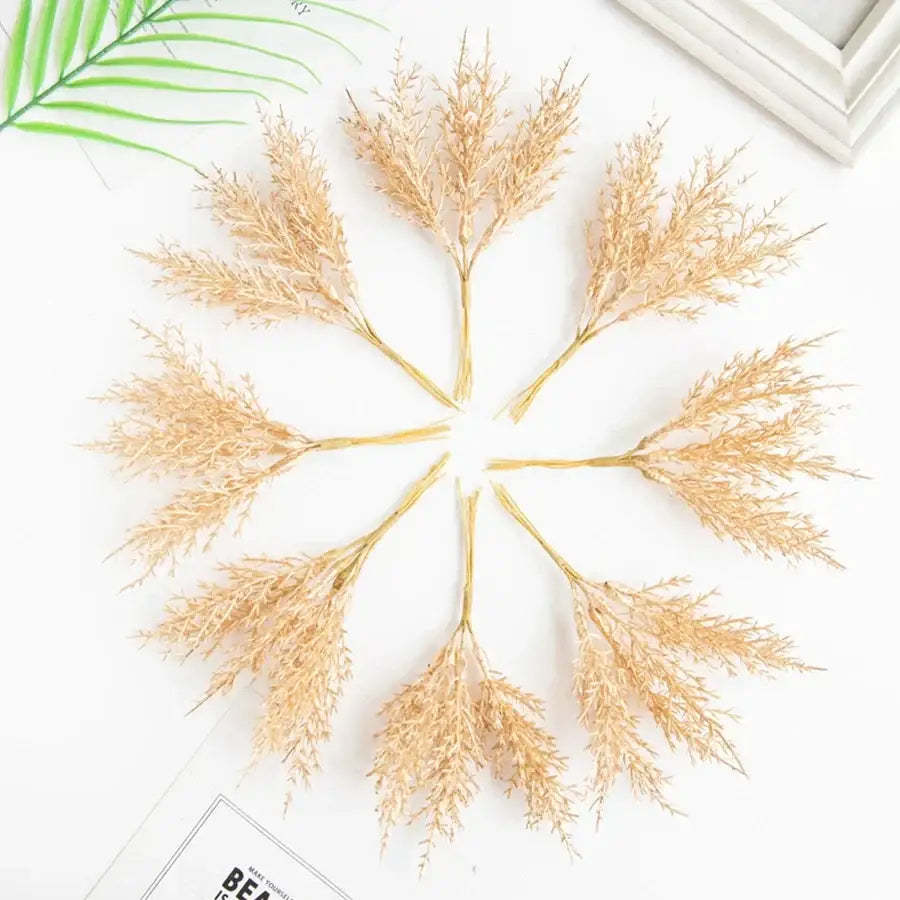 Golden feathery artificial autumn branches set arranged in a circular pattern for decorbites artificial autumn decor