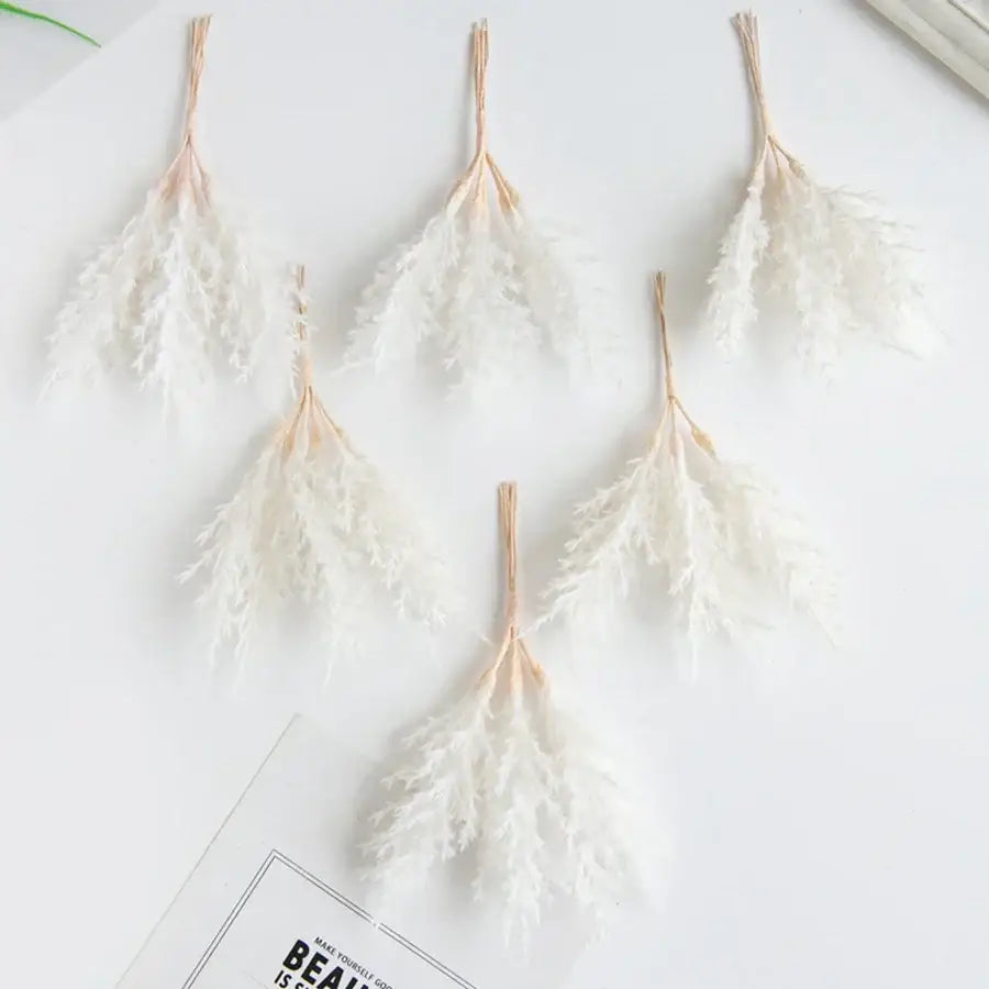 White feathery dried pampas grass with natural tan stems in golden artificial autumn branches set decorbites artificial autumn
