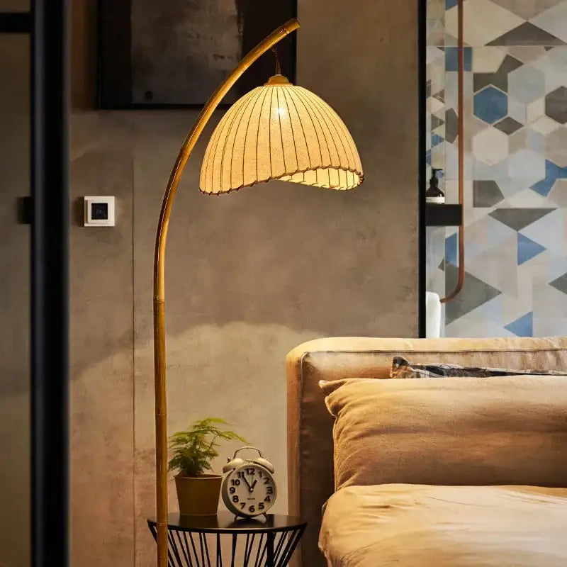 Golden bamboo shaped led floor lamp with warm-toned bamboo arc and woven rattan shade on marble base for living room decorbites floor lamp