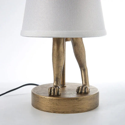 Bronze-finished bathing rabbit resin table lamp with sculpted legs and white fabric shade for bedroom decorbites decor